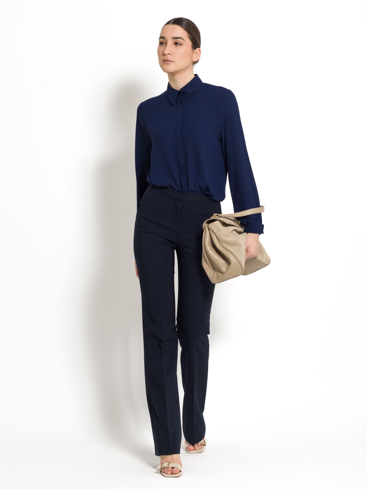 Viscose shirt with concealed button closure.