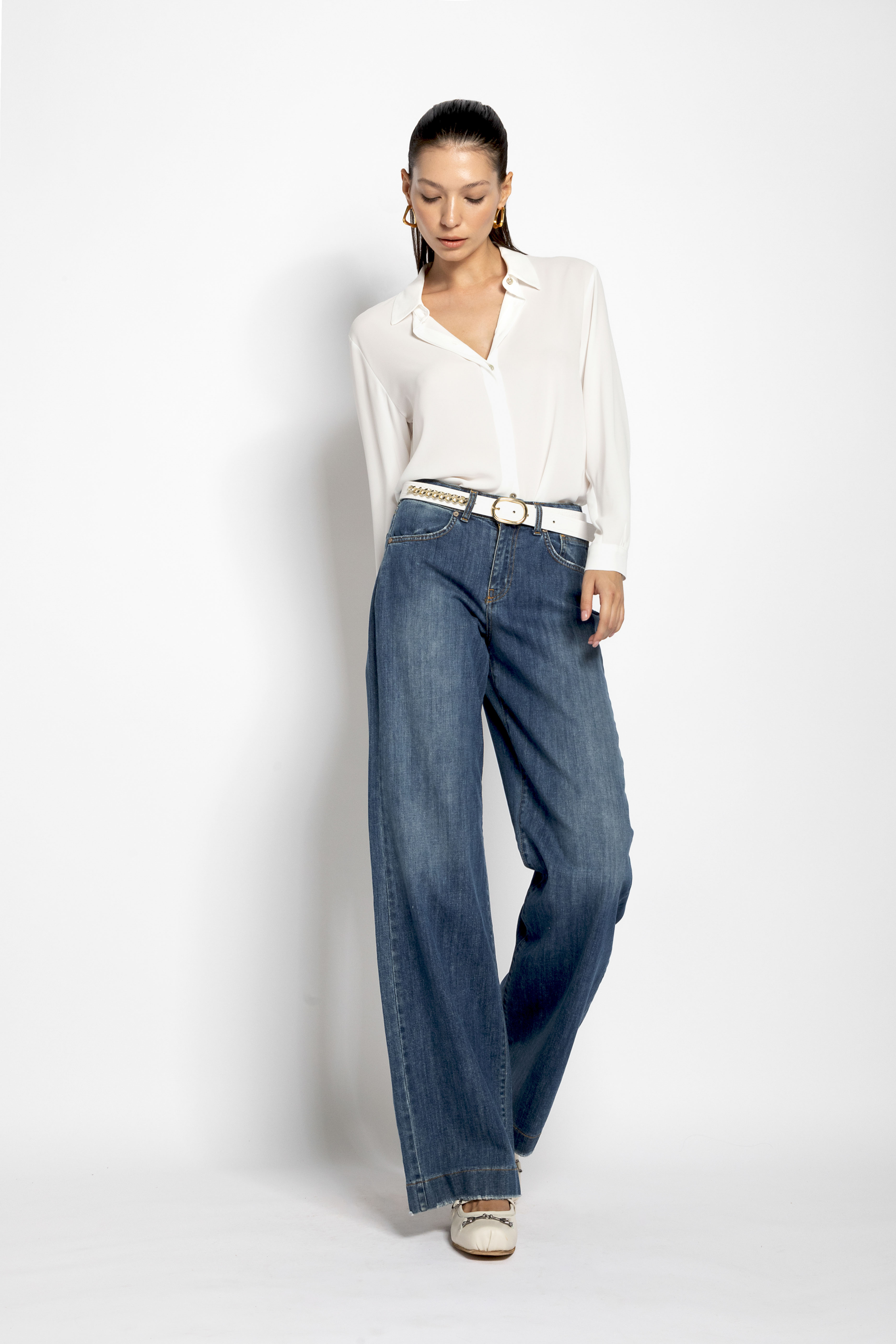 Viscose shirt with concealed button closure.