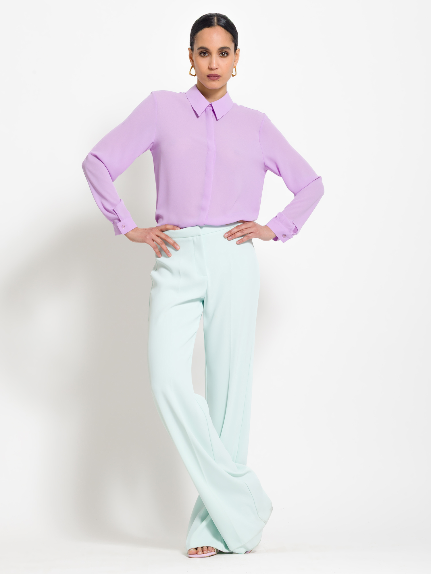 Viscose shirt with concealed button closure.